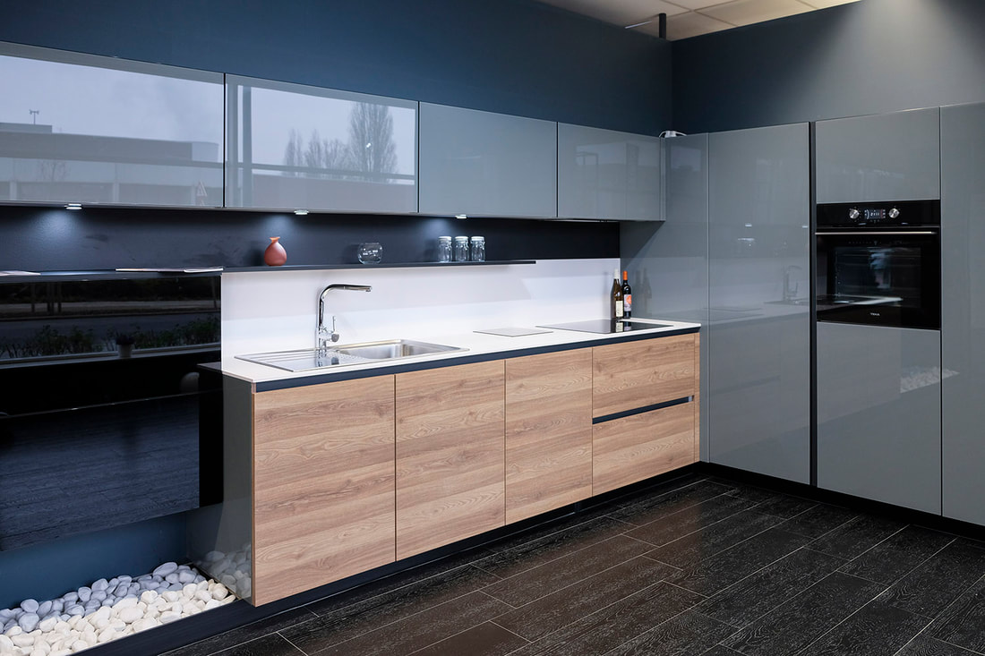 Sleek modern kitchen with grey cabinets
